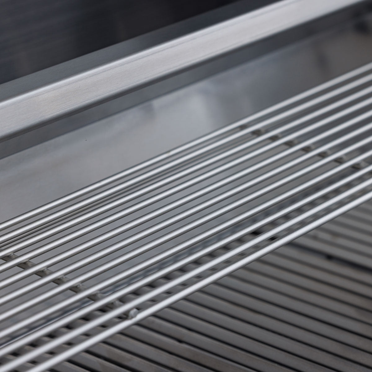 Triangular stainless cooking rods on the Blaze BCM grill
