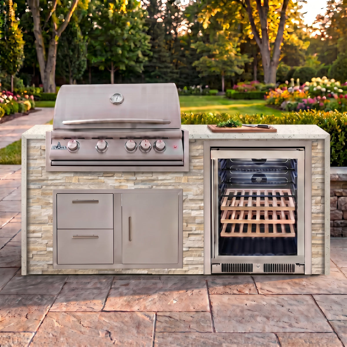 Sunkissed Dune outdoor kitchen with Frosted Ember granite countertop on a stone paver patio beside a backyard garden