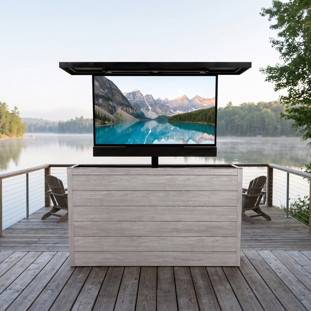 Drifted Cypress 6 inch ArtisanPlank outdoor TV lift cabinet with the TV raised on a cedar lakeside deck