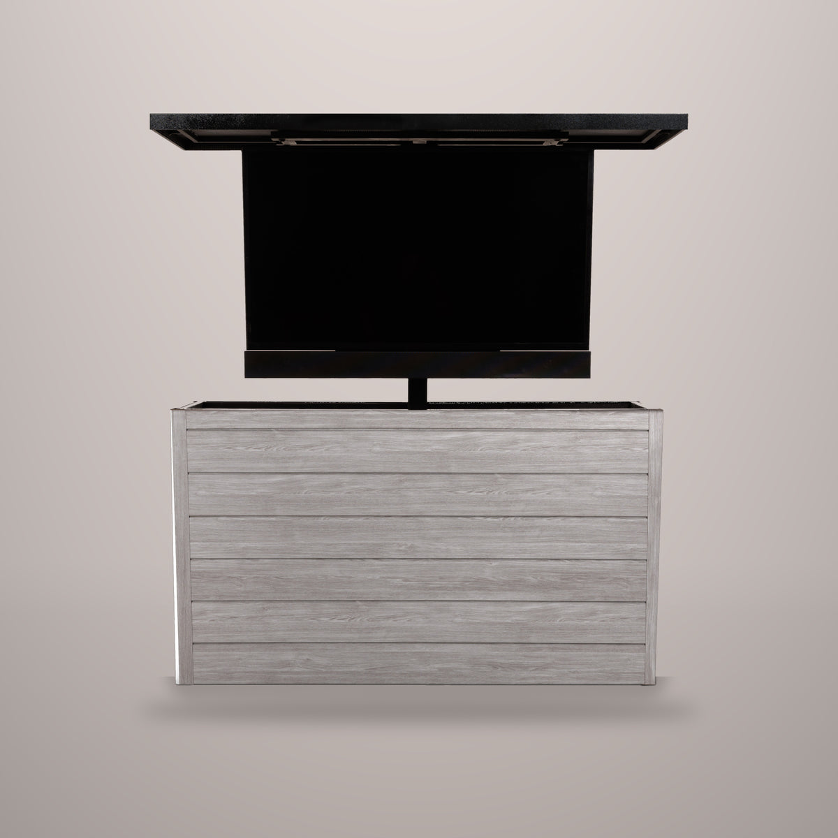 Drifted Cypress 6 inch ArtisanPlank outdoor TV lift cabinet with the TV raised and a hammered black aluminum top