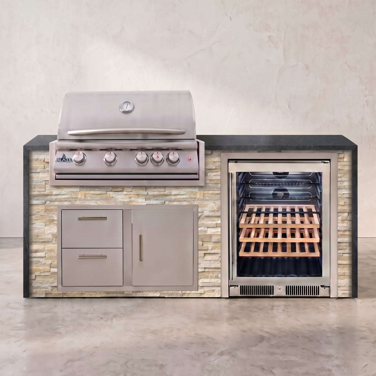 Big Ridge 6 ft Blaze waterfall outdoor kitchen in Sunkissed Dune stacked stone with Charred Onyx granite
