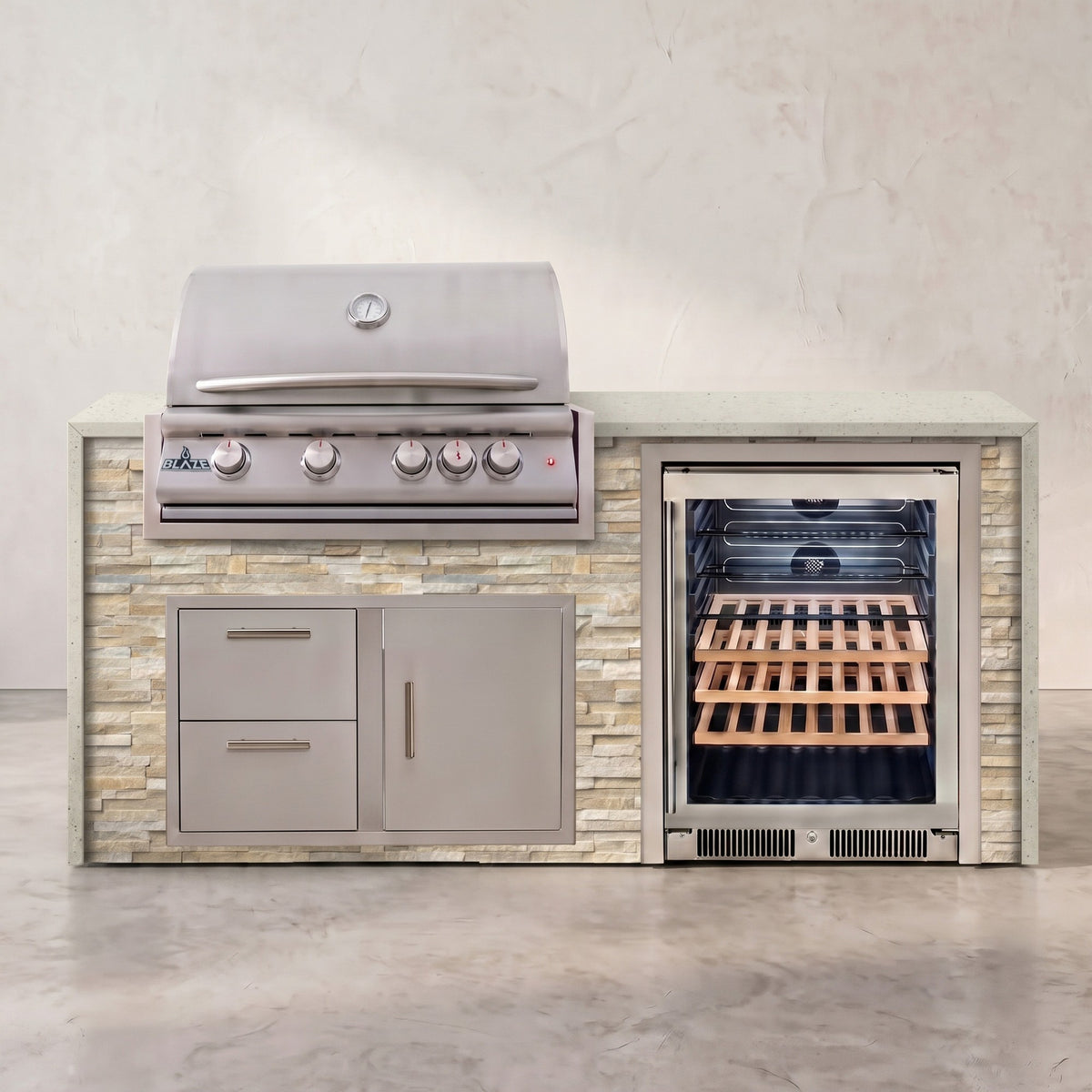 Big Ridge 6 ft Blaze waterfall outdoor kitchen in Sunkissed Dune stacked stone with Frosted Ember granite