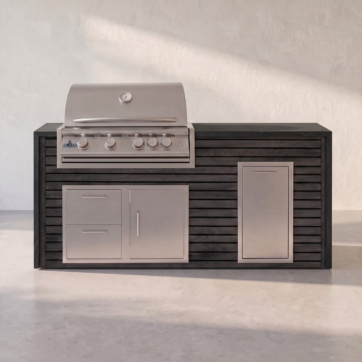 Big Ridge 6 ft Blaze waterfall outdoor kitchen with trash drawer in Cindered Ash Artisan Plank with Charred Onyx granite