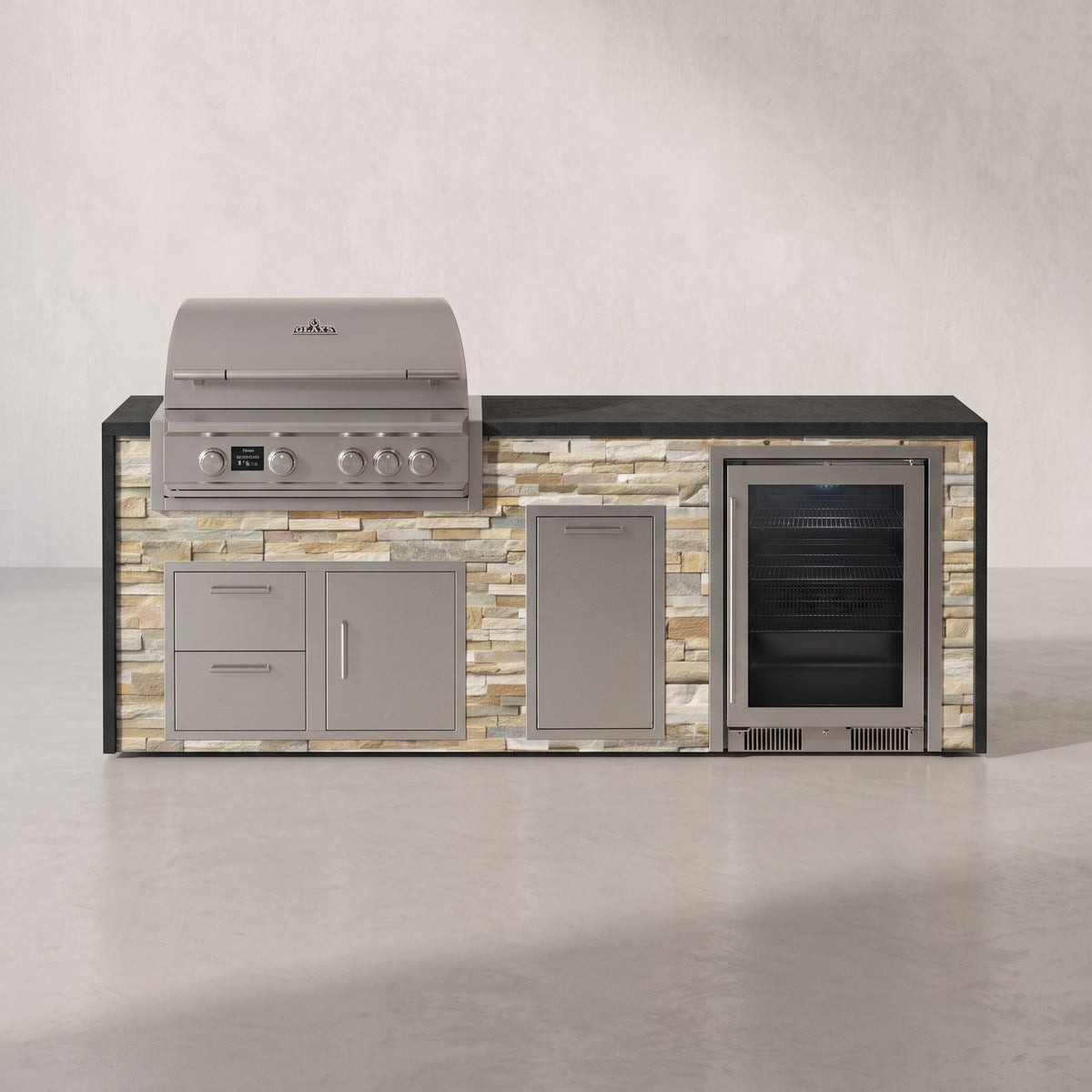 Big Ridge 8 ft Blaze waterfall outdoor kitchen with beverage cooler in Sunkissed Dune stacked stone with Charred Onyx granite